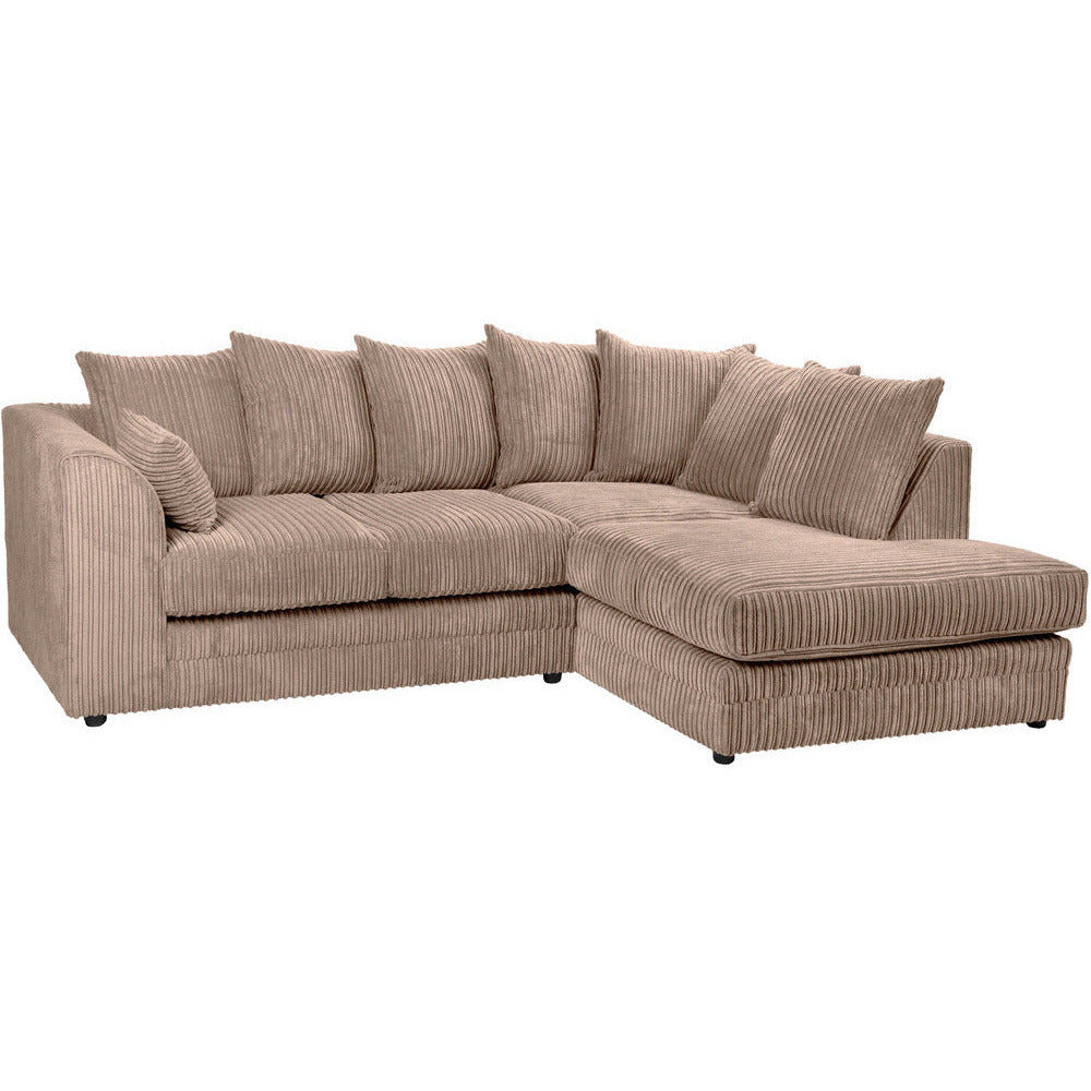 A beige jumbo corduroy fabric corner sofa with fibre filled scatter cushions and sprung seats, set against a white background.