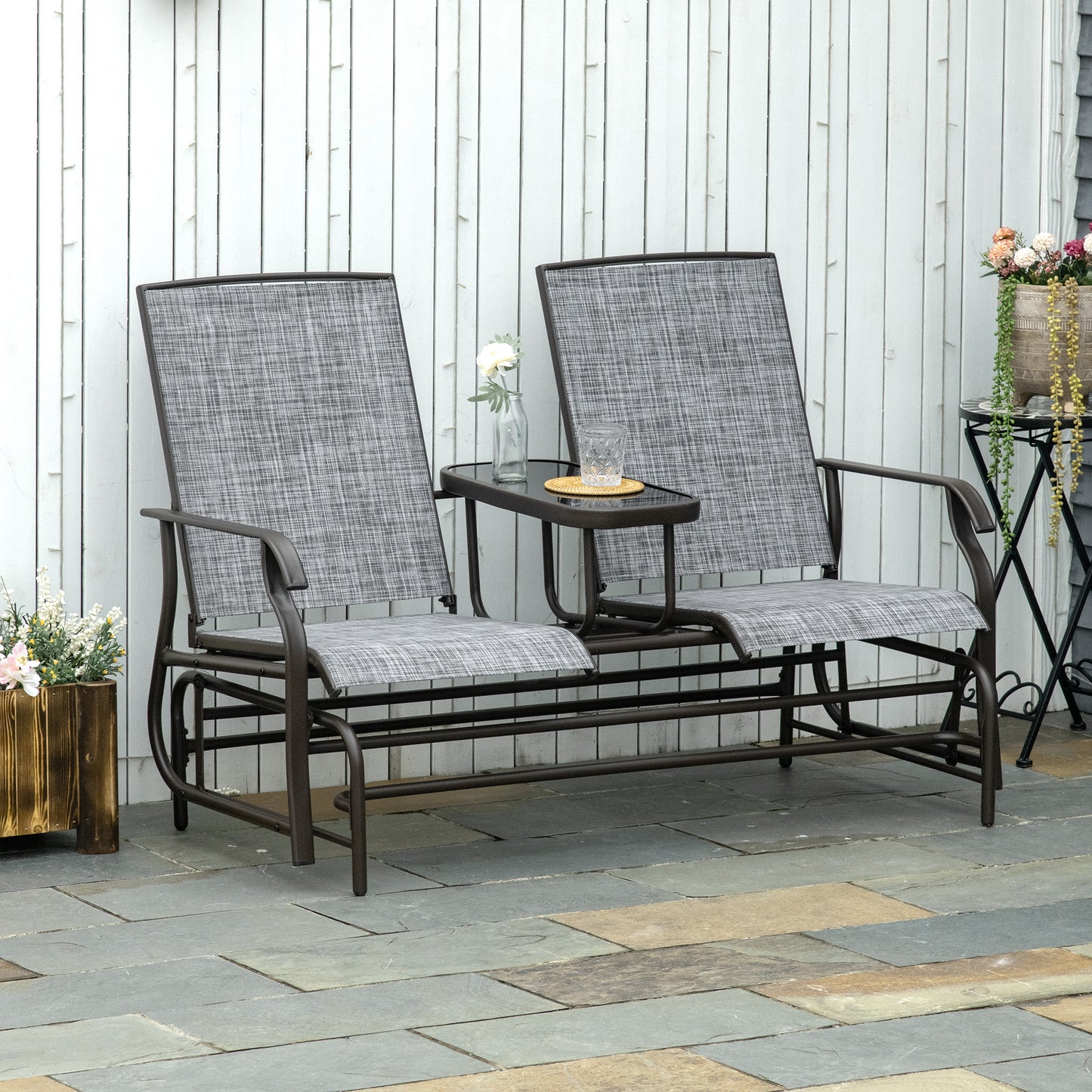 Outsunny 2 Seats Garden Glider Bench, Metal Frame Loveseat with Glass Top Centre Table, Porch Rocking Glider for 2 Person, for Deck, Patio, Brown/ Grey