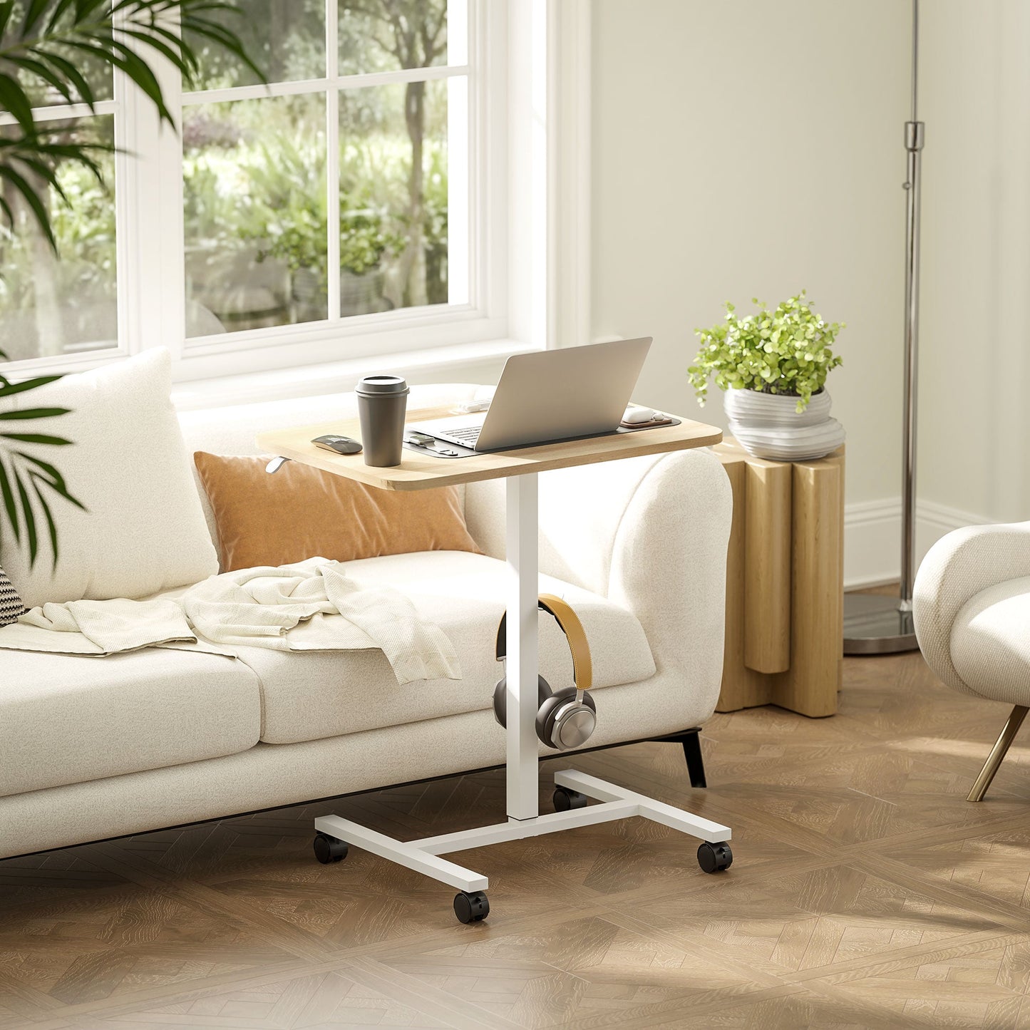 HOMCOM Height Adjustable Standing Desk, Pneumatic Sit Stand Desk for Laptop, Mobile Overbed Table with Wheels and Headphone Hook for Home Office, Natural Wood Finish