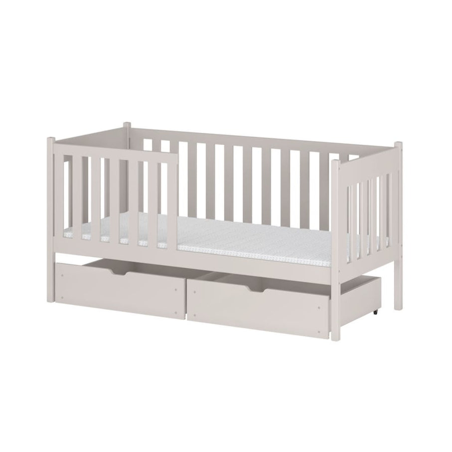 White crib with a trundle on a white background
