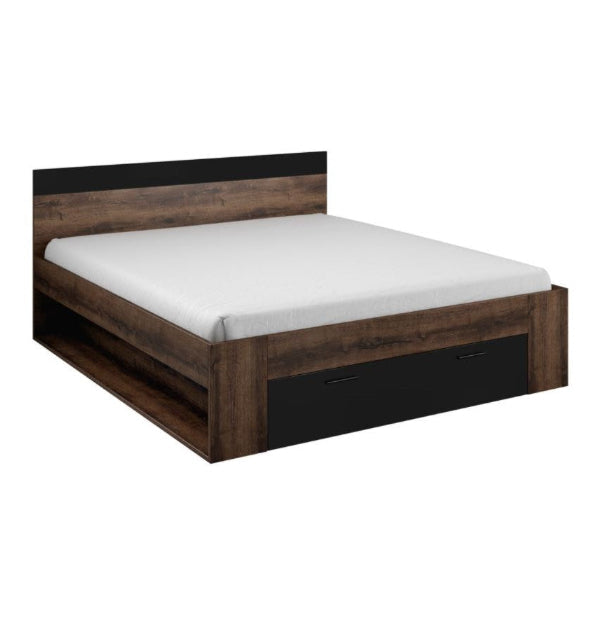 Wooden bed frame with white mattress on a white background