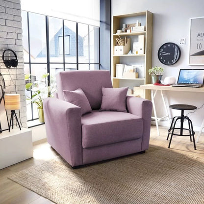 A pink velvet sofa bed with dark wooden legs, situated in a room with minimalistic decor, next to a window.