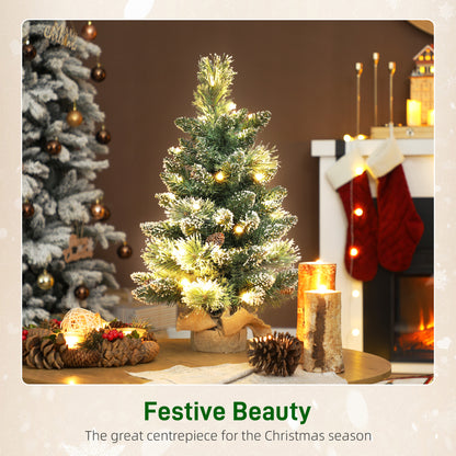 HOMCOM 60 cm Prelit Small Christmas Tree, Snow Flocked Tabletop Mini Xmas Tree with 35 LED Lights, Pine Cones and Linen Cover Base, Battery Operated, Green