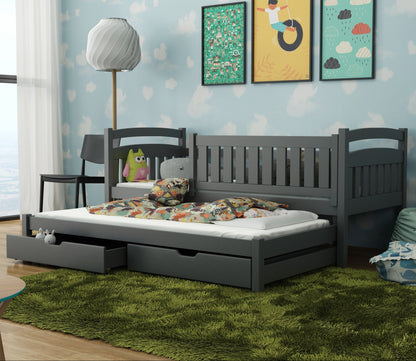Children's bedroom with a gray bed, colorful bedding, and wall art.
