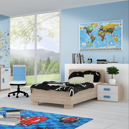 Children's bedroom with a world map on the wall, bed, and toys on the floor.