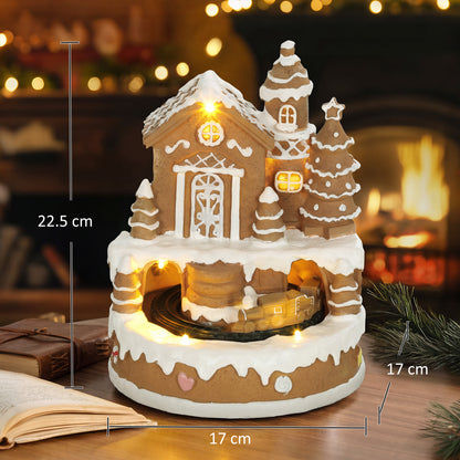 HOMCOM Christmas Gingerbread House, Lighted Musical Snow Village with Rotating Train, LEDs, Tunes, Battery Operated