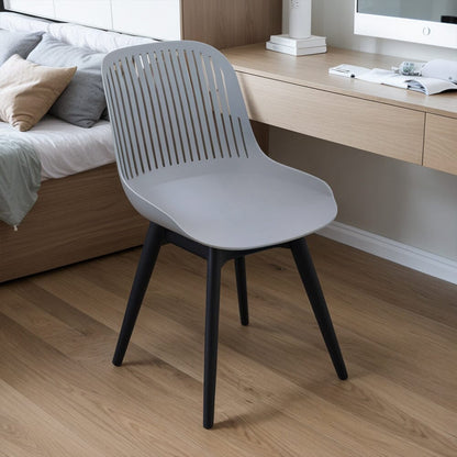 Classic White Plastic Chair, Set of Four, Durable and Lightweight