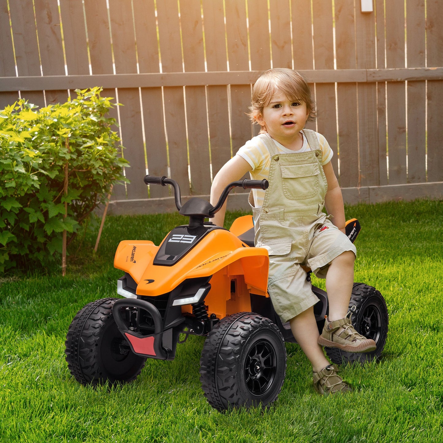 HOMCOM McLaren Licensed 12V Quad Bike, with Music, Headlights, MP3 Slot, Suspension Wheels, for Ages 3-8 Years - Orange