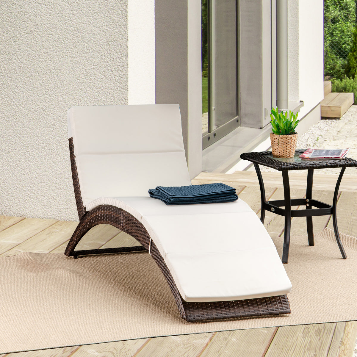 Outsunny Folding Sun Lounger, PE Rattan Garden Lounger Chair with Soft Padded Cushion, Ergonomic Curved Design Sun Bed for Balcony, Garden, Brown